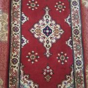 Small Persian rug from the 1960s.