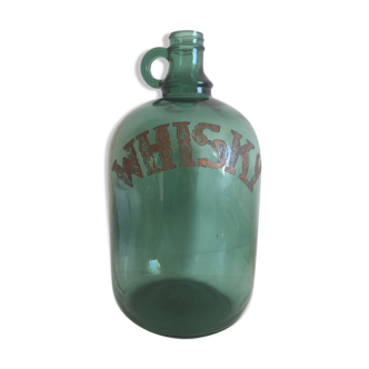 Green glass whiskey bottle