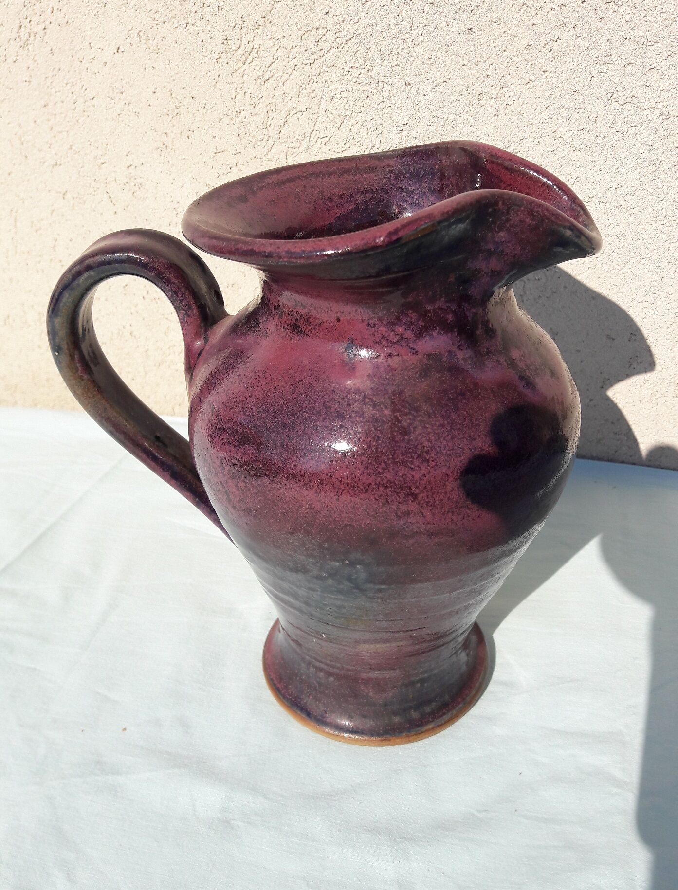 Signed ceramic pitcher