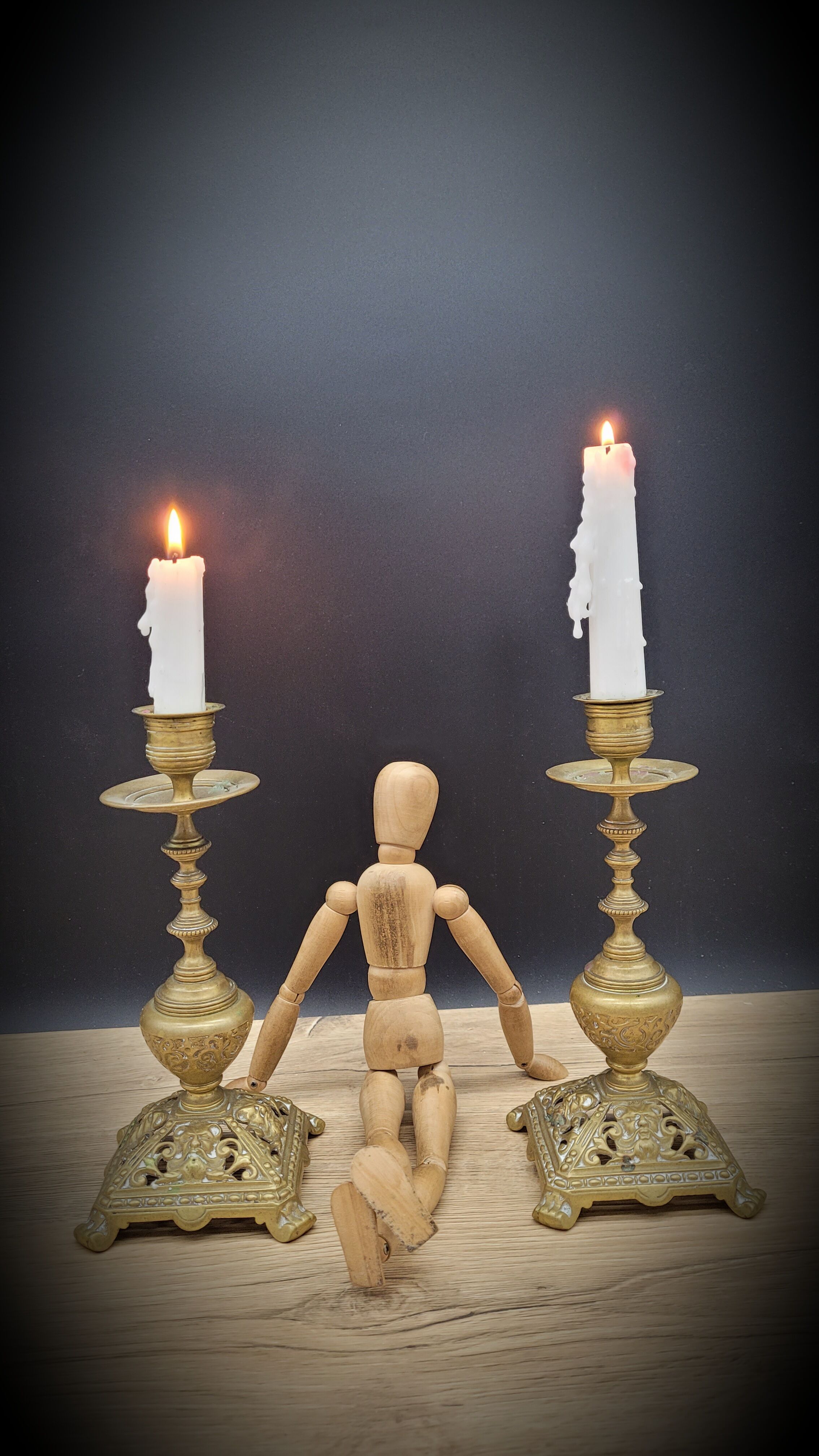 Duo worked brass candle holders