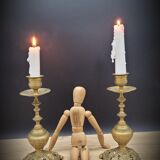 Duo worked brass candle holders