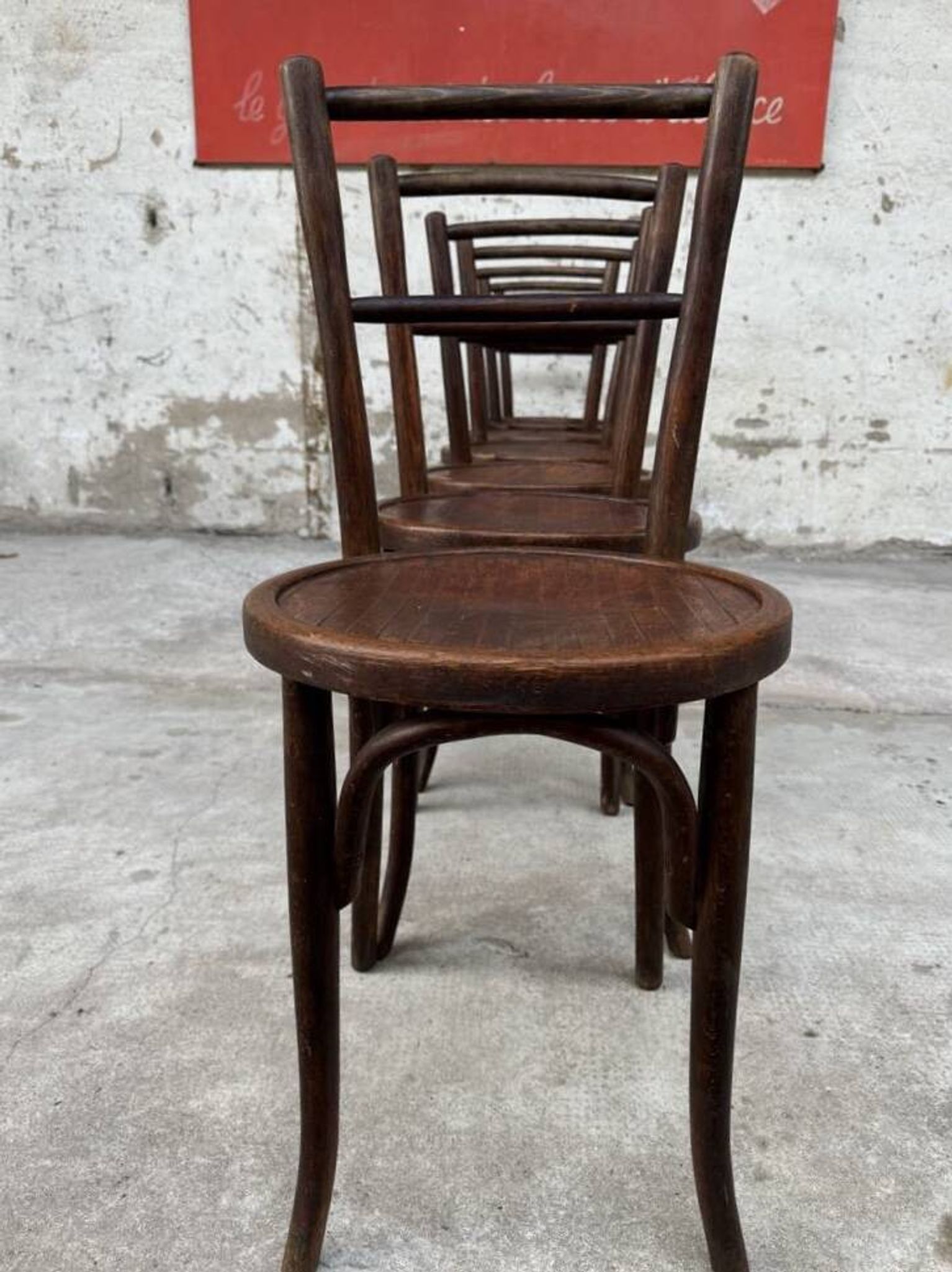Set of 7 old Baumann bistro chairs in curved wood with round seat