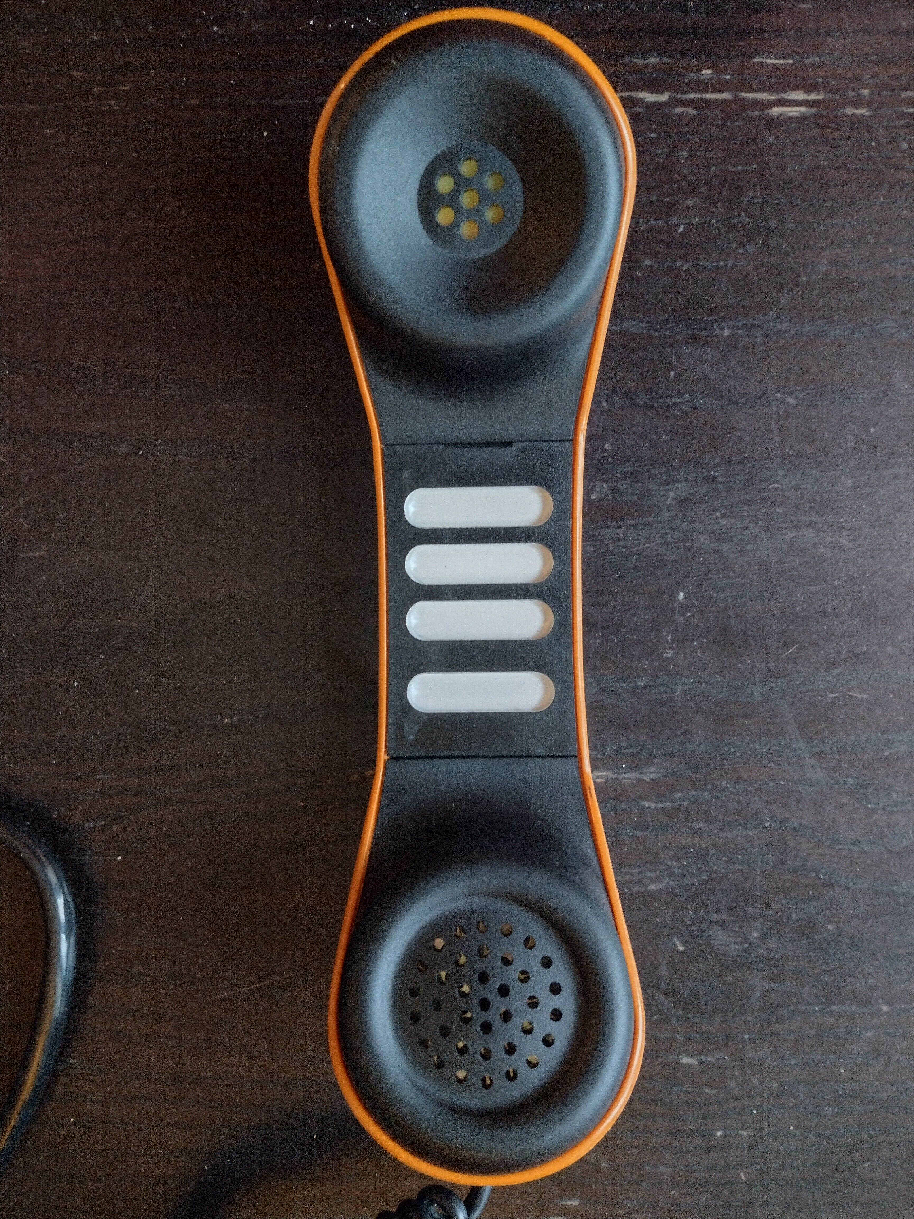 Vintage orange telic phone with ptt dial