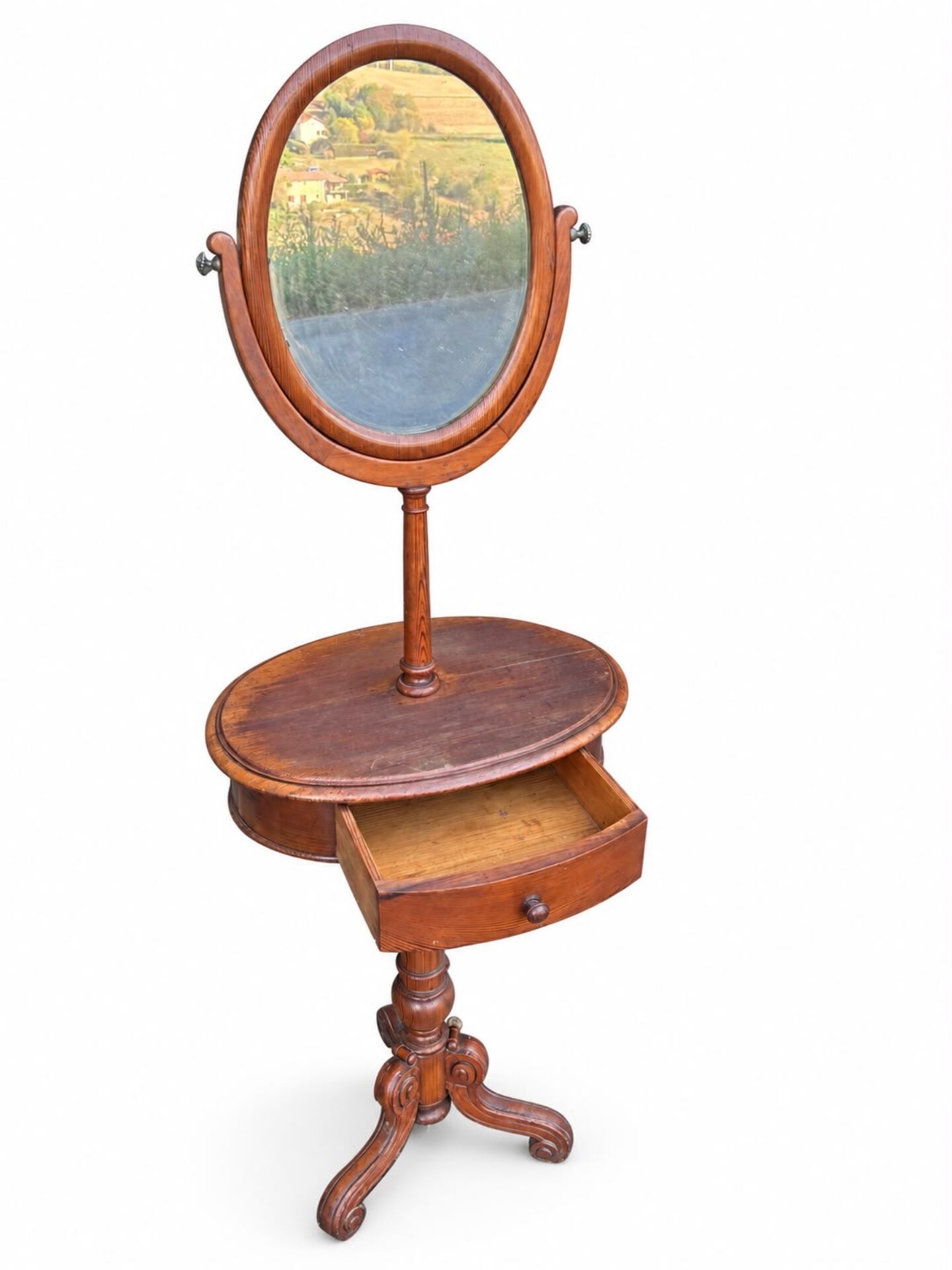 Barber's or shaving mirror on a Victorian stand. 19th century.