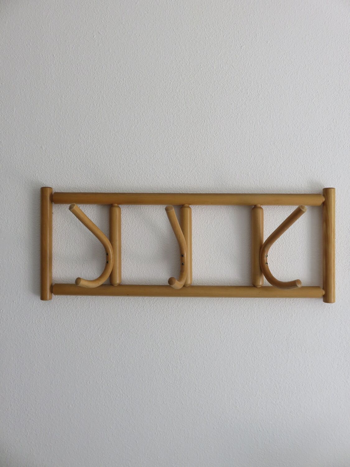 Curved wooden wall coat rack from the 70s-80s.