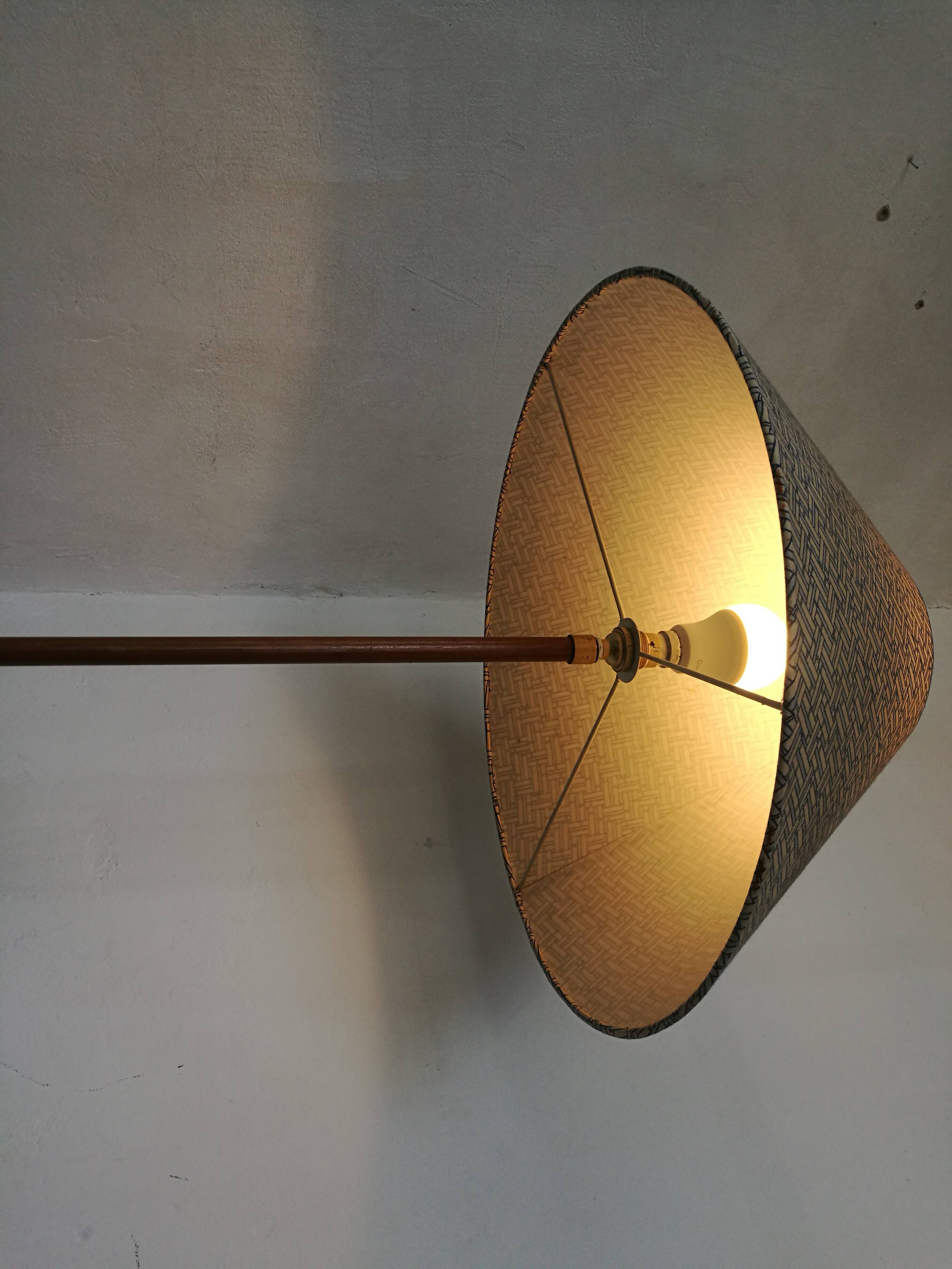 Wood and brass floor lamp