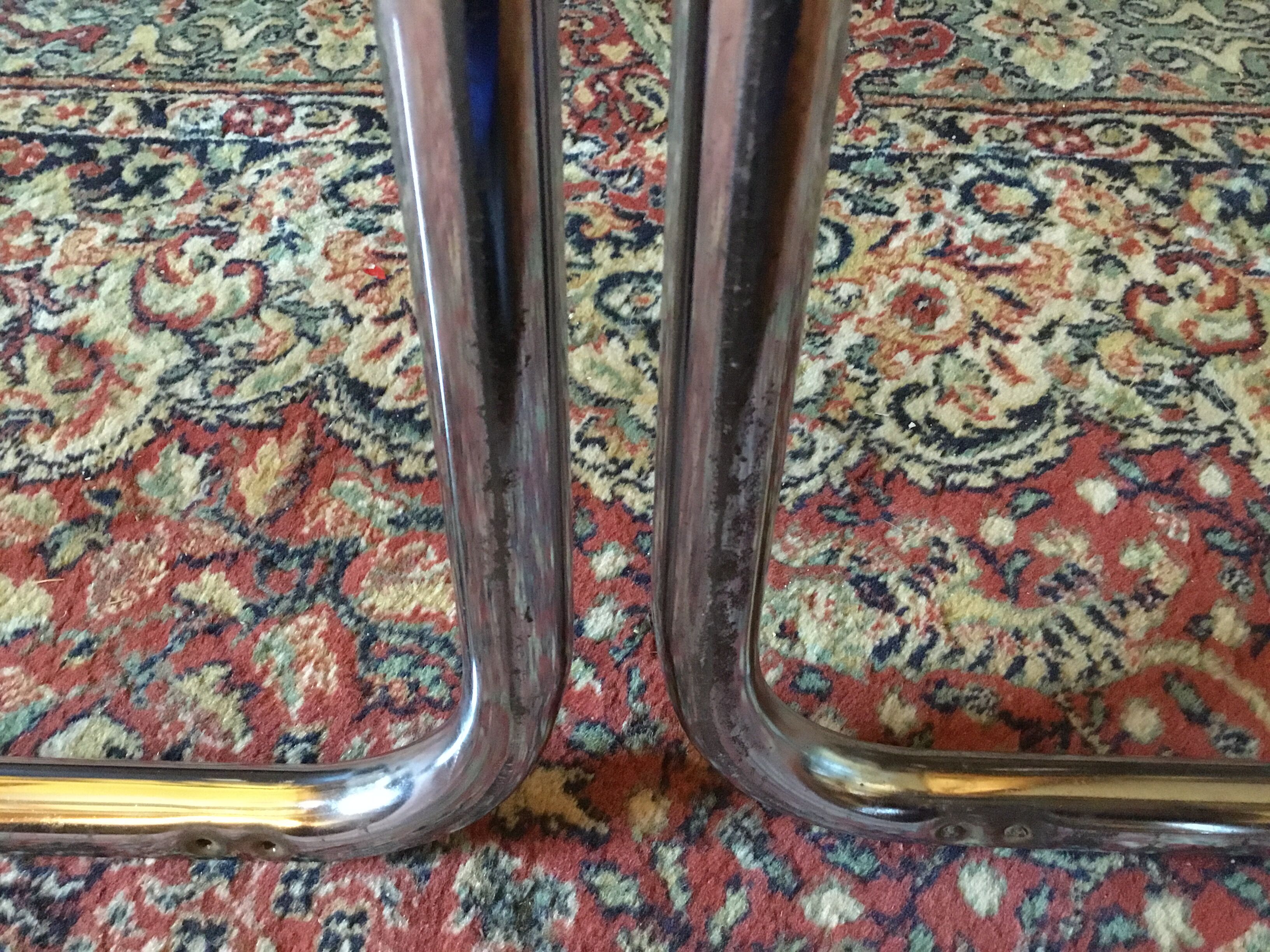 Leather and steel armchairs