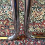 Leather and steel armchairs