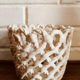 Woven earthenware pot
