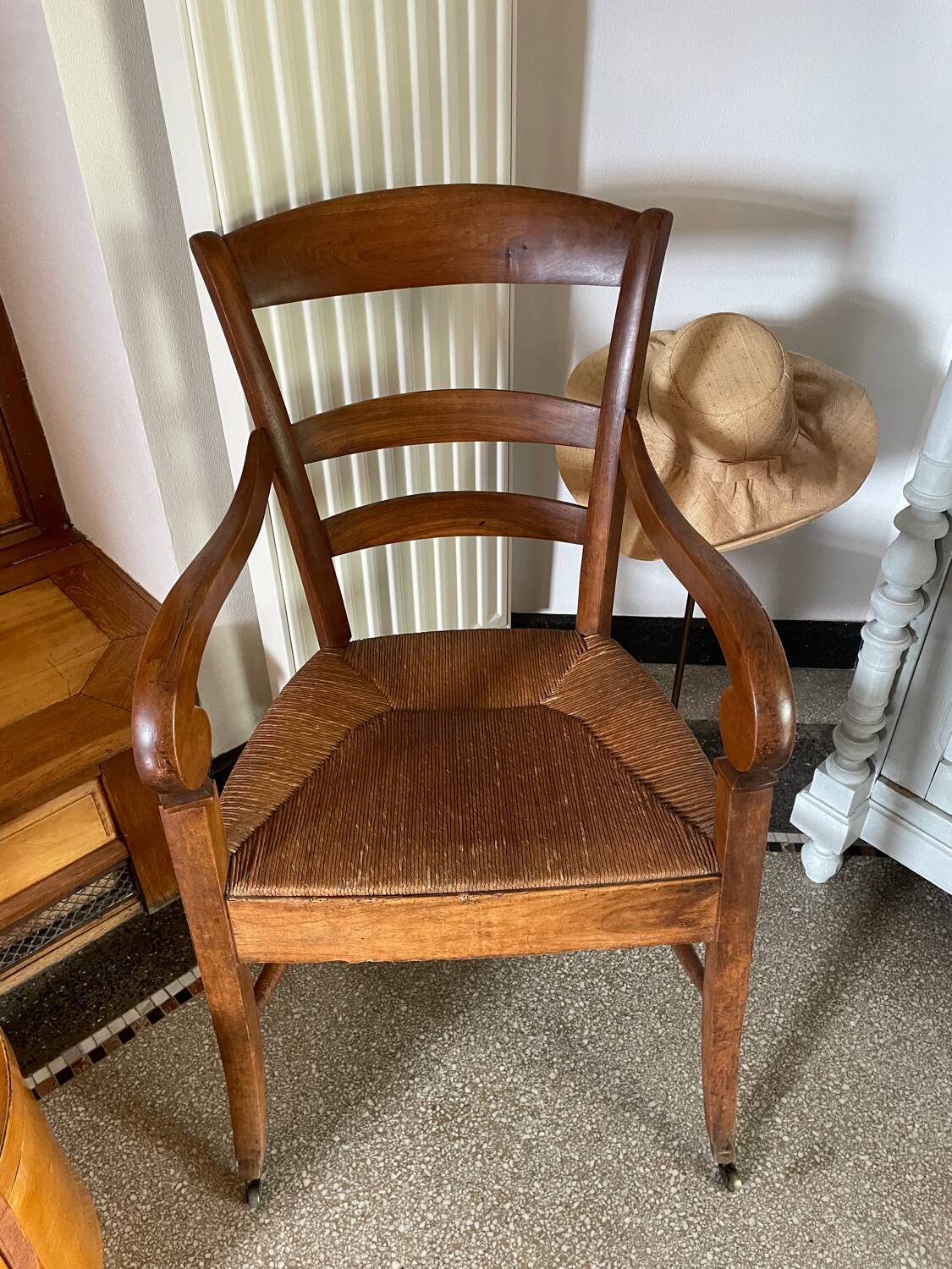 Restoration period straw armchair