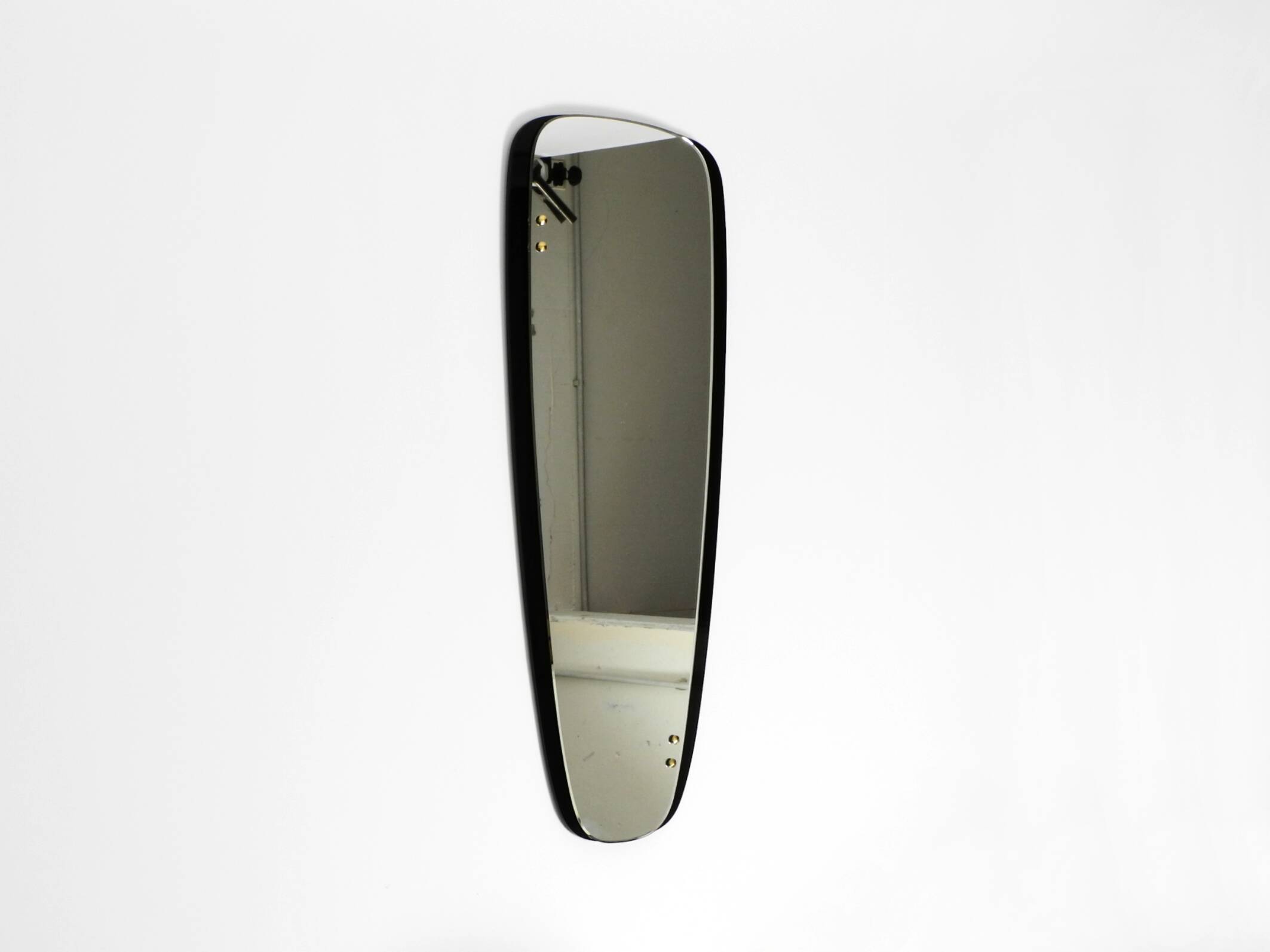 Large Mid Century wall mirror with extraordinary black glass frame