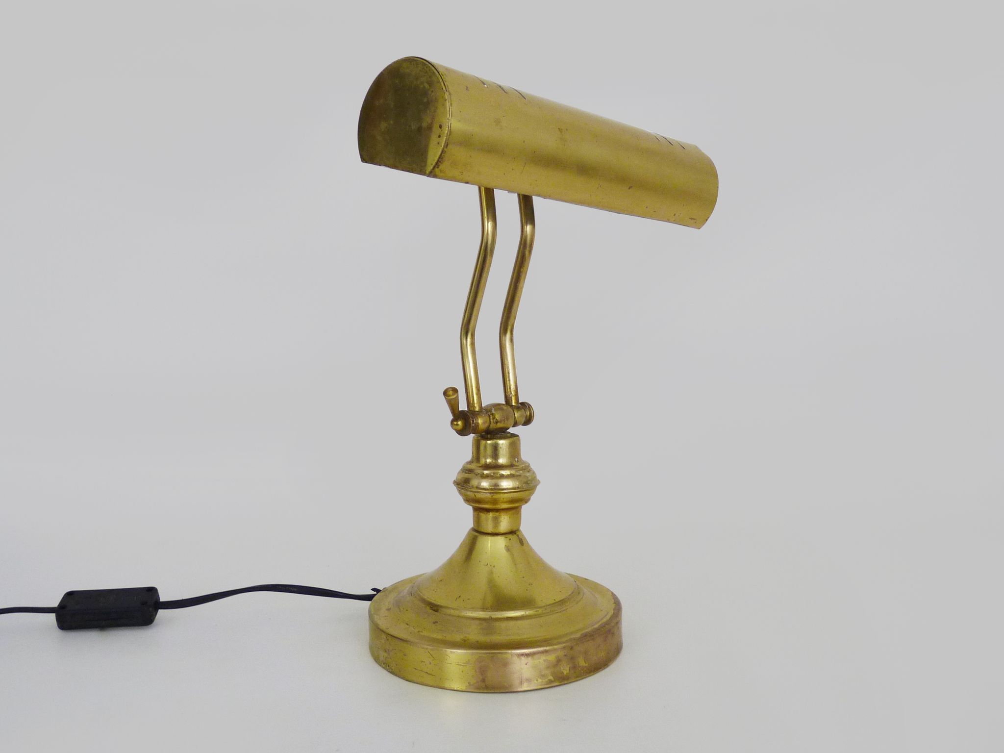 Old articulated piano lamp