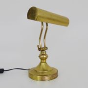 Old articulated piano lamp