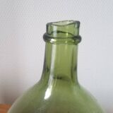 Vintage green demijohn