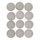 Set of 12 stylised white porcelain dinner plates, signed.