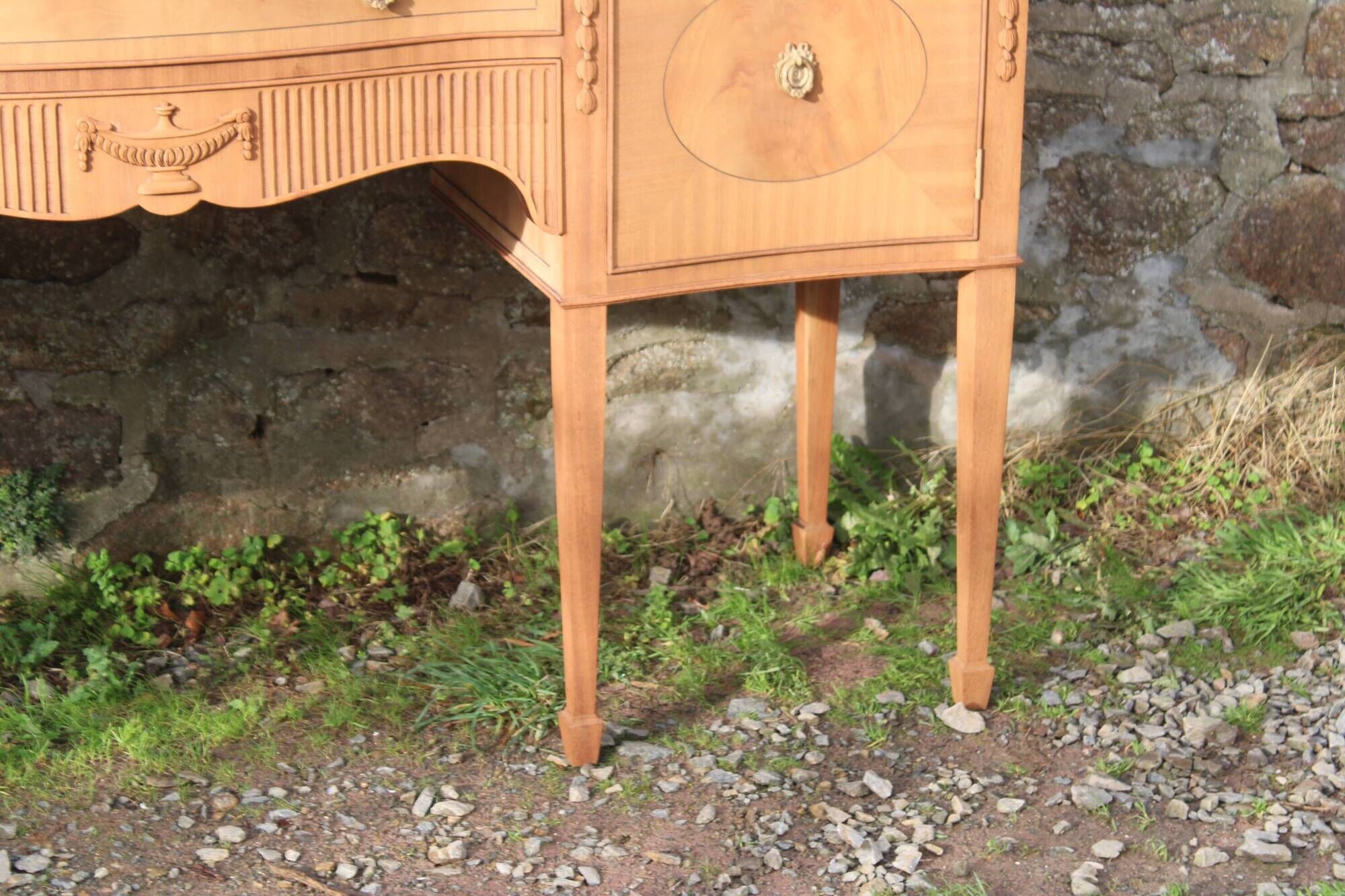 English-made enfilade in Louis XVI style with light wood veneers.