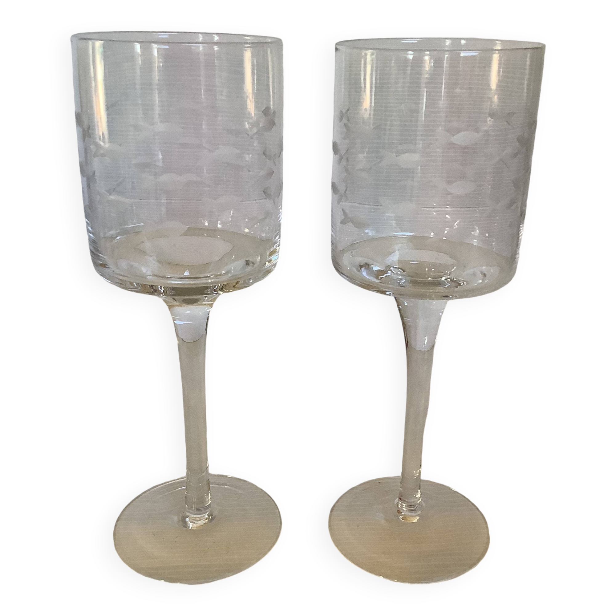 Duo of cut glass fish candle holders