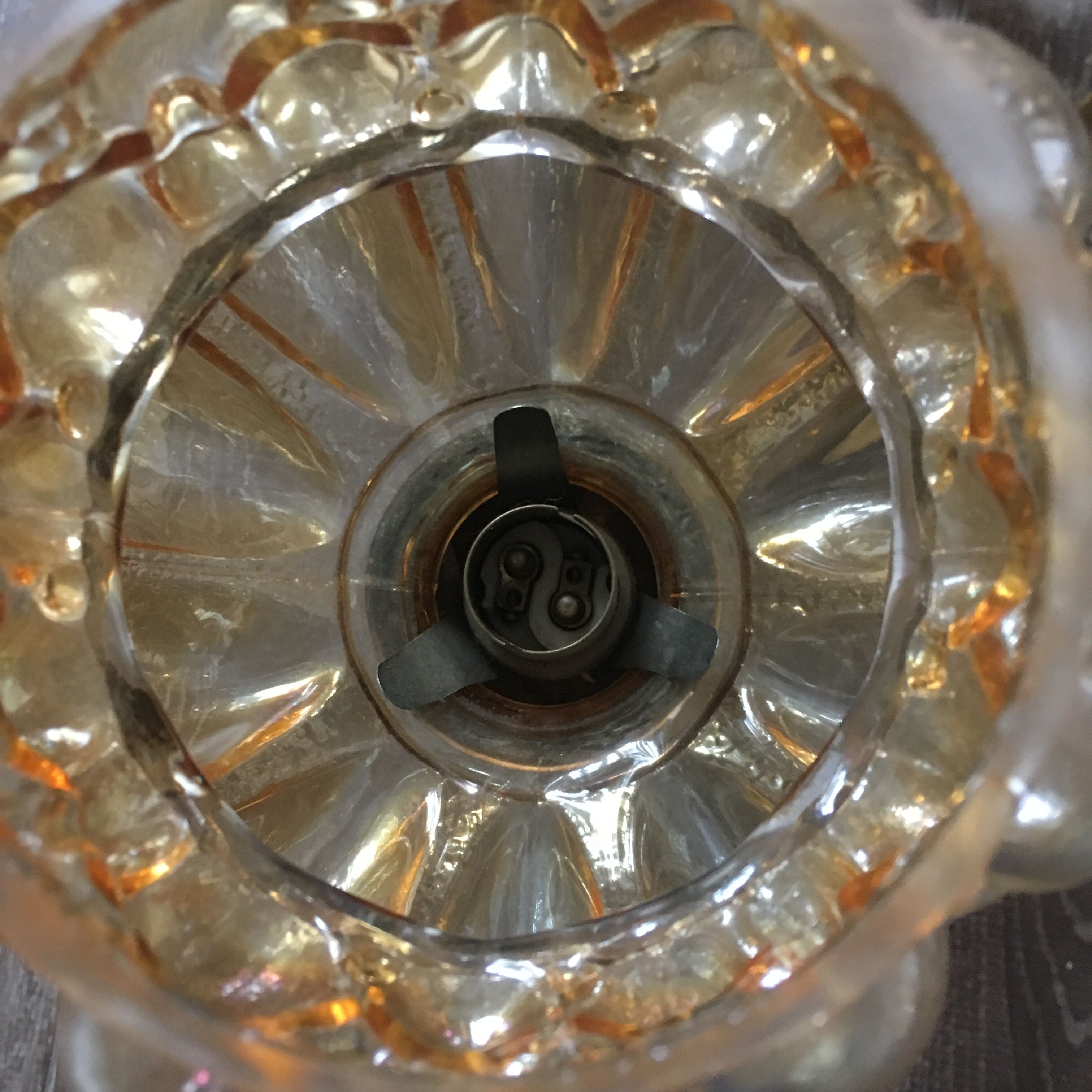 Brass-style chandelier and puffed glass 60/70