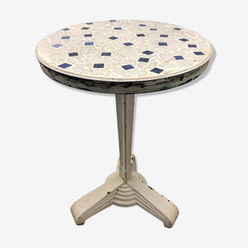Art Deco cast garden table and porcelain shard tray