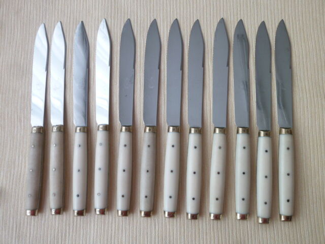 Set of 12 vintage stainless steel bakelite and brass table knives