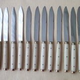 Set of 12 vintage stainless steel bakelite and brass table knives