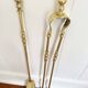 19th-century brass fireplace tongs and shovel.