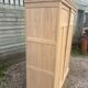 Large antique wardrobe in raw wood