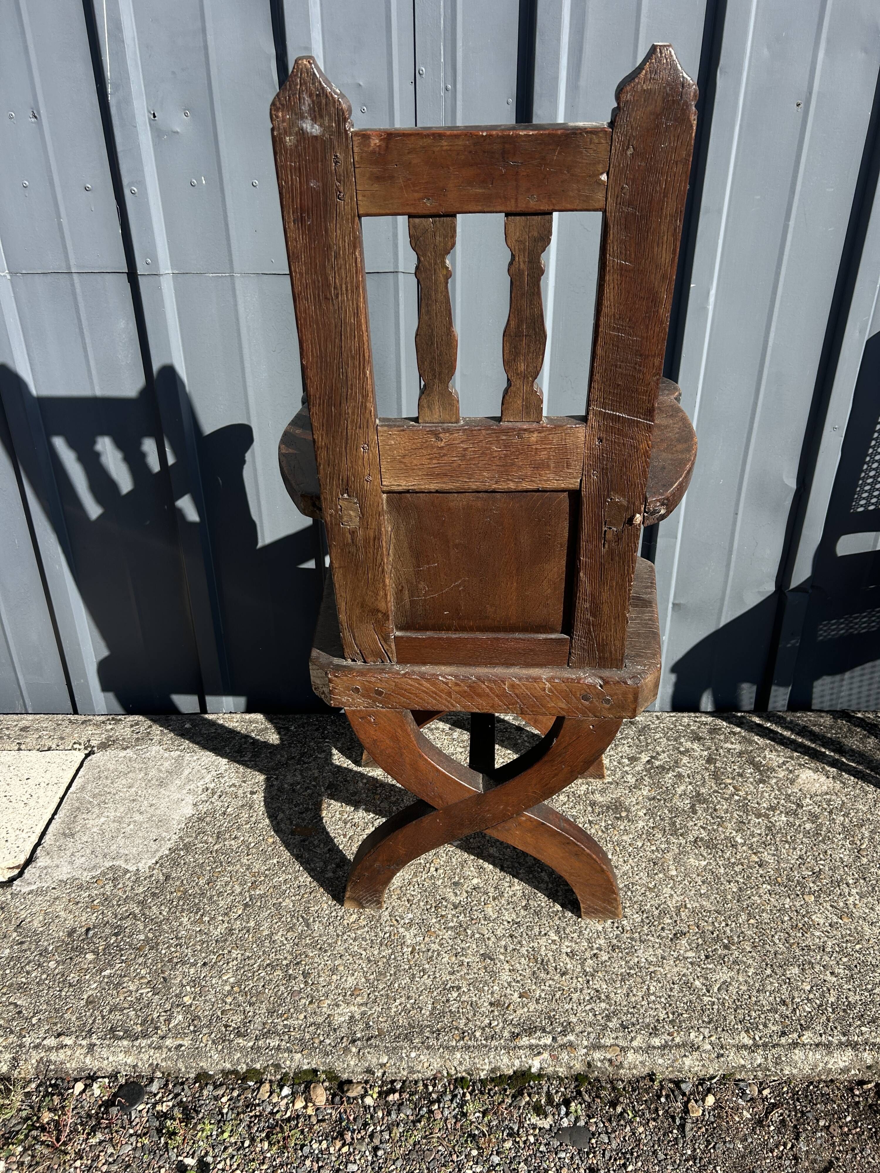 Antique oak armchair, high period