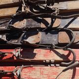 3 pairs of old skis