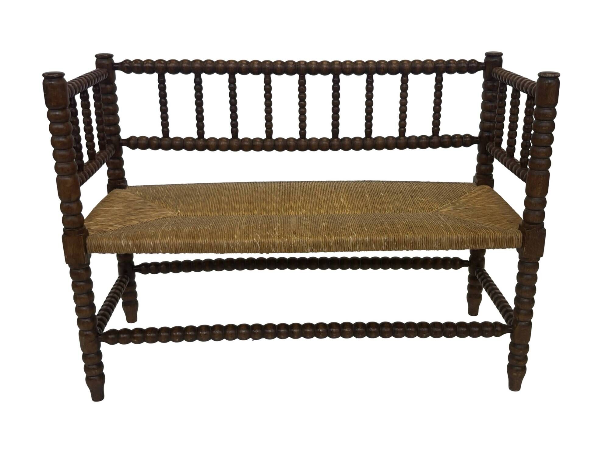 Vintage 'bobbin' bench with a rush seat, 1920s design with armrests.