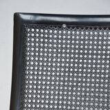 Black leather armchair and canning