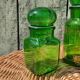 Duo of pots and jars apothecary style in green glass.