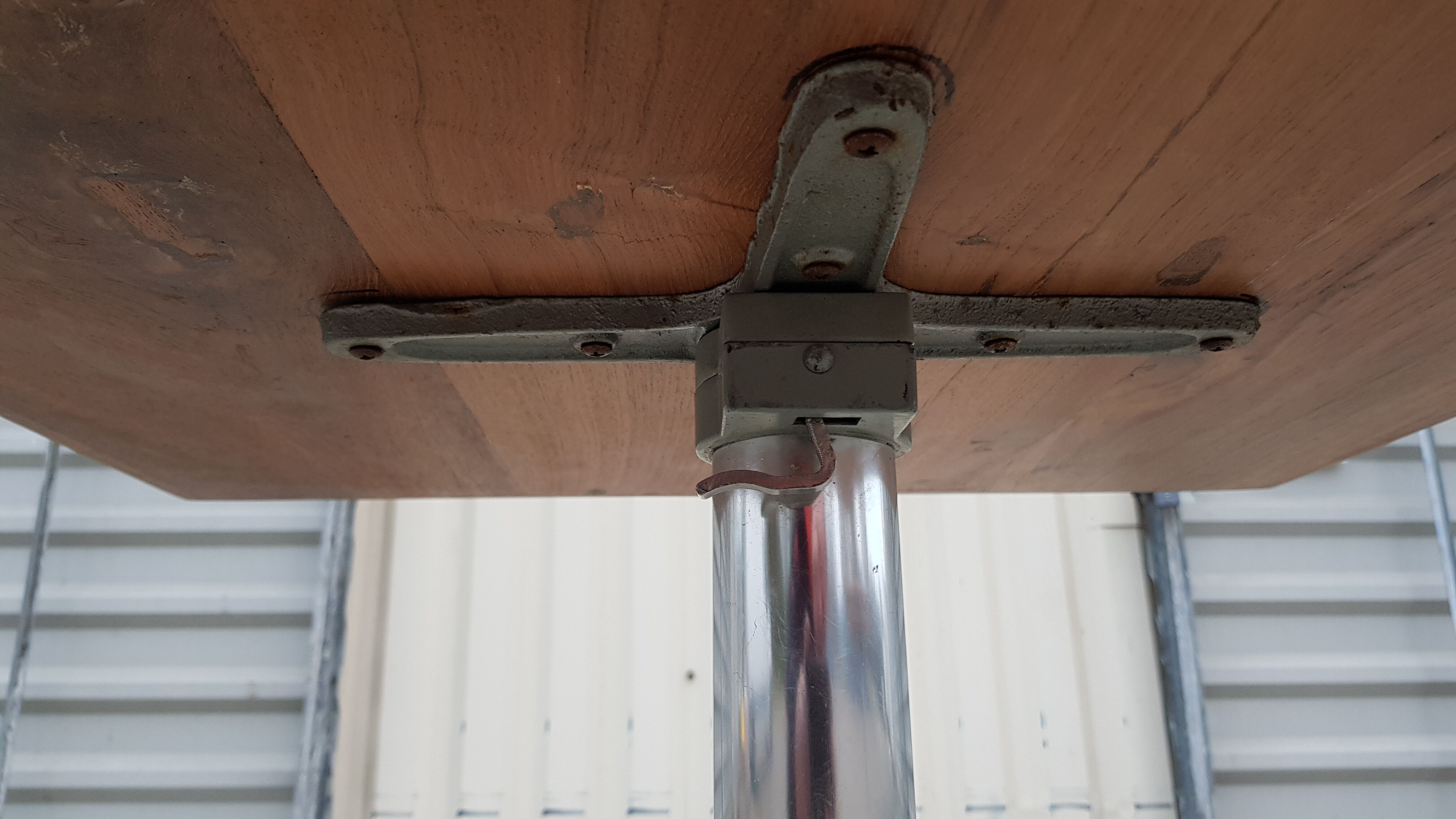 Foldable bistro table with teak top and aluminum base