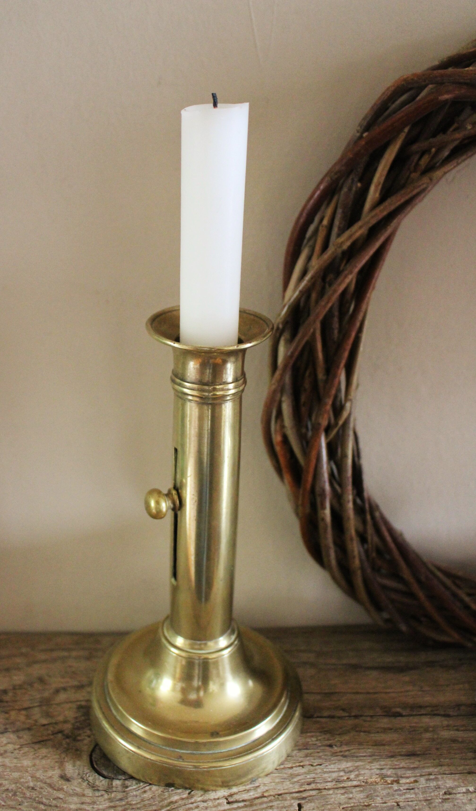 Candlestick flambeau brass pusher