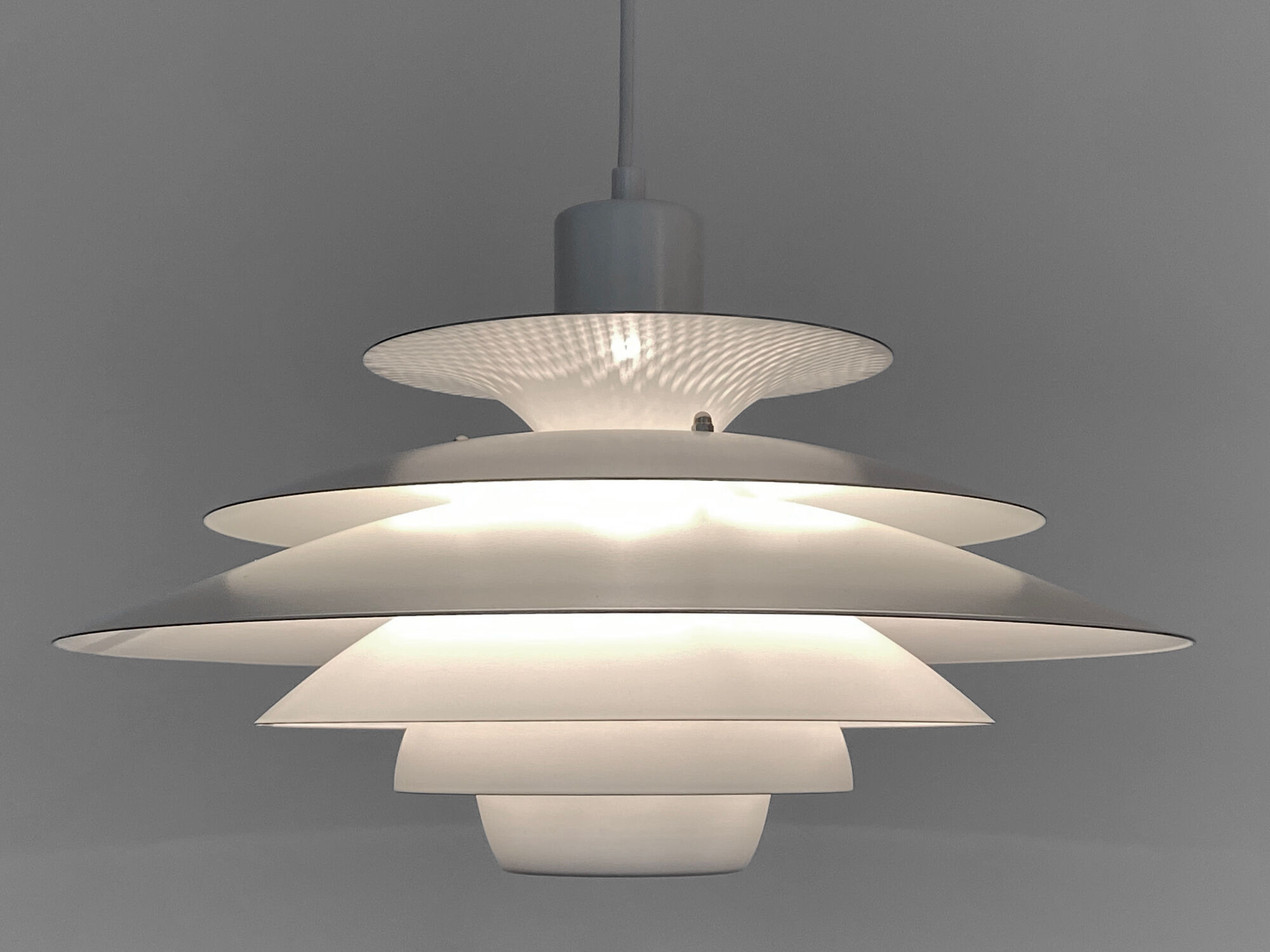 Multi layered pendant light by Kurt Wiborg for Jeka Metaltryk. Denmark 1970s
