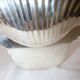 Silver-plated metal shell plate stamped Fleuron