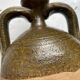 Persimmon glazed terracotta oil jar