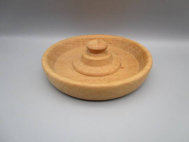 Empty pocket in turned wood