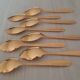 Small golden metal spoons