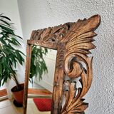 Carved wooden mirror