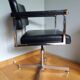 Swivel office chair Strafor with chrome metal and black faux leather.
