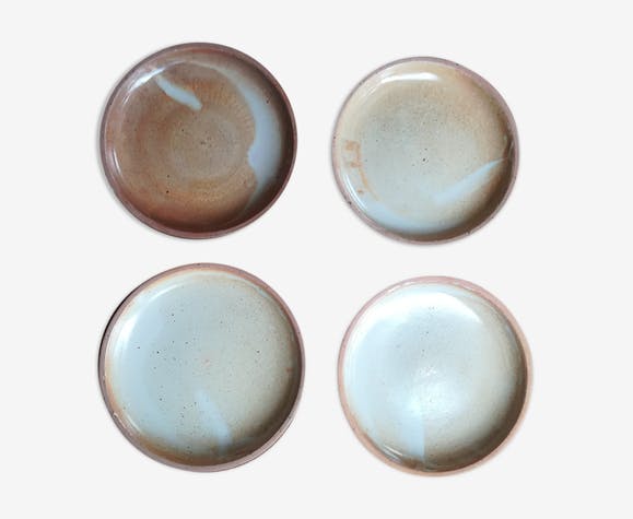 Lot of 4 deep plates made of vintage sandstone