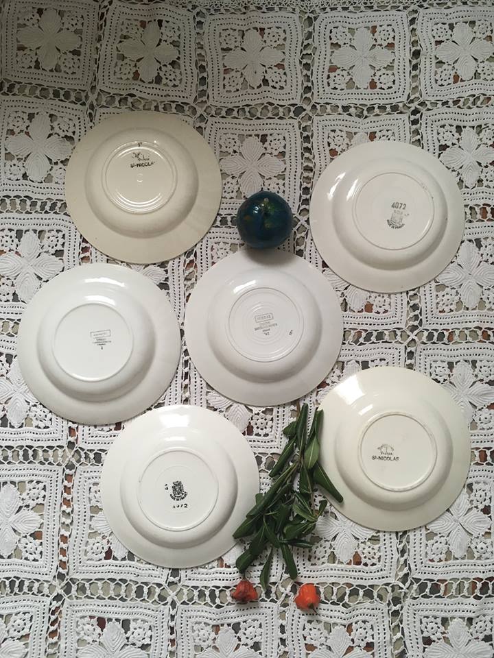 Six soup plates don't match in red and blue