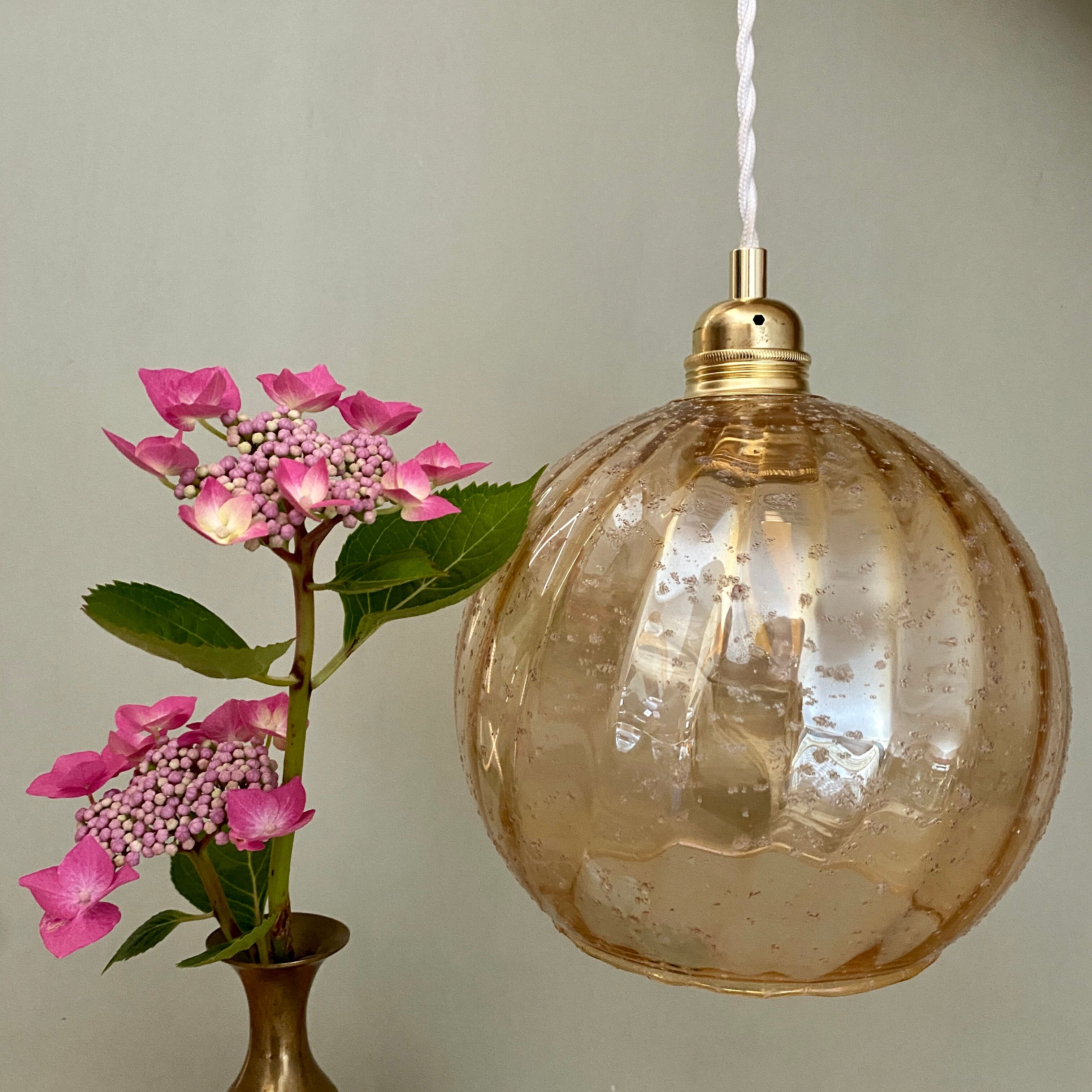 Vintage globe pendant lamp in amber glass
