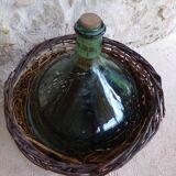 Dame-jeanne in her basket