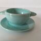 Earthenware bowl and saucer in glazed water green ceramic.