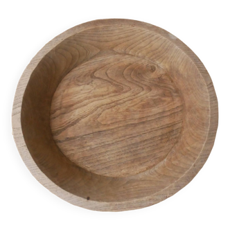 Raw wooden dish carved in the mass ethnic African art handmade artisanal manufacturing