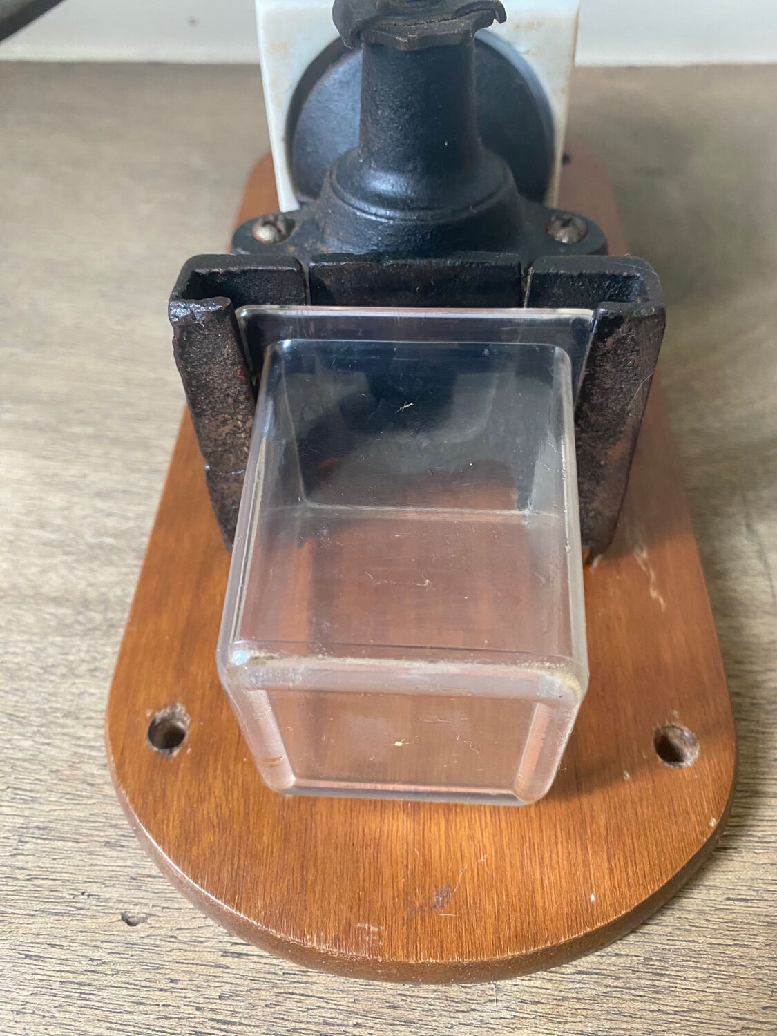 Old wall-mounted coffee grinder