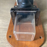 Old wall-mounted coffee grinder