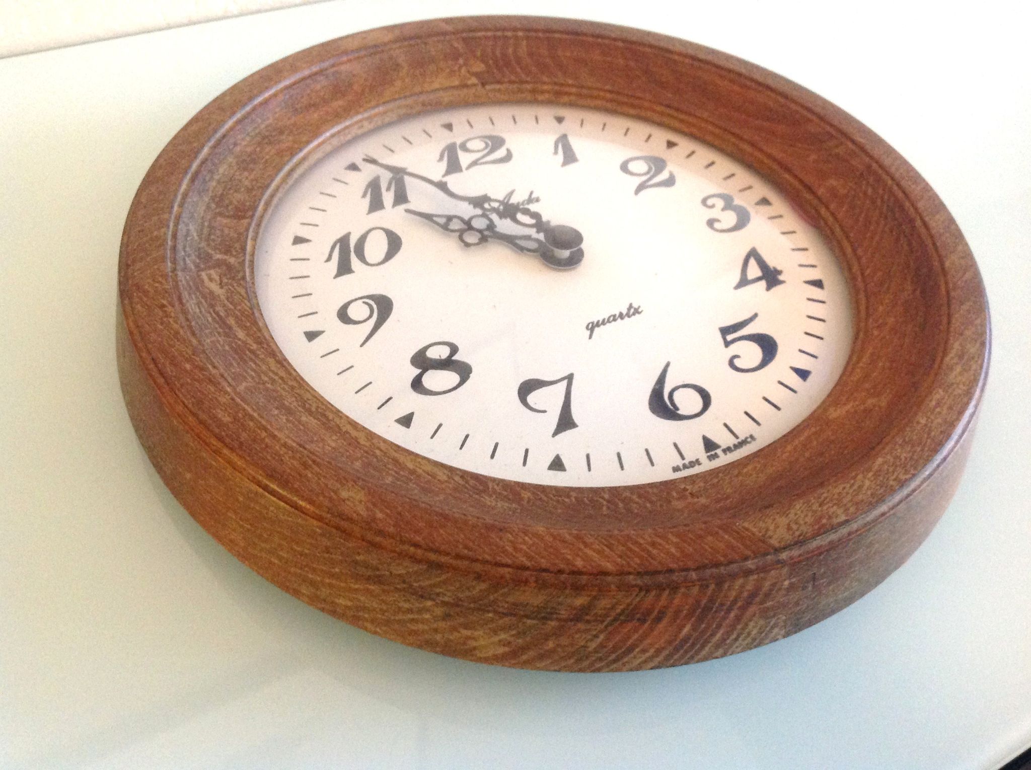 Old round wooden clock, vintage 70